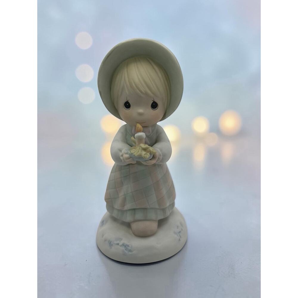 Porcelain figurine titled 'December' by Precious Moments, Enesco 1988